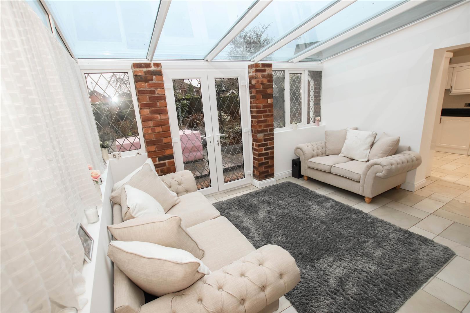 HALF BRICK & UPVC DOUBLE GLAZED CONSERVATORY